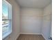 Walk-in closet with wire shelving and window at 80 Heyman Dr, Covington, GA 30016