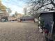 View of house and backyard with shed at 891 Daniell Se Dr, Smyrna, GA 30080