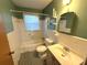 Bathroom with bathtub, toilet, and sink at 891 Daniell Se Dr, Smyrna, GA 30080