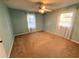 Bedroom with light blue walls and tan carpeting at 891 Daniell Se Dr, Smyrna, GA 30080