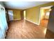 Laminate floors and neutral walls in this open living room at 891 Daniell Se Dr, Smyrna, GA 30080