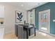 Small dining area with table and chairs near kitchen and back door at 471 Payne Dr, Mcdonough, GA 30253