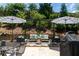 Private backyard oasis with pergola, seating area, and fire pit at 121 Treeline Trl, Canton, GA 30115