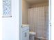 Clean bathroom with a plaid shower curtain at 121 Treeline Trl, Canton, GA 30115