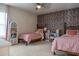 Twin bedroom with mushroom wallpaper and built-in desk at 121 Treeline Trl, Canton, GA 30115