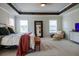 Bright and airy bedroom with a comfortable sitting area and ample natural light at 121 Treeline Trl, Canton, GA 30115