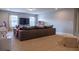 Spacious bonus room with large sectional sofa at 121 Treeline Trl, Canton, GA 30115