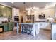 Modern kitchen with two-toned cabinets, granite countertops, and stainless steel appliances at 121 Treeline Trl, Canton, GA 30115