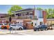 Modern brick building with outdoor patio seating and street view at 2804 Lillian Ln, Douglasville, GA 30135
