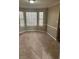 Bright dining room with bay window and neutral wall colors at 3575 Oakvale Falls Ct, Decatur, GA 30034