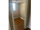 Laundry closet with vinyl flooring and hanging rod at 3575 Oakvale Falls Ct, Decatur, GA 30034