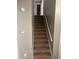 Carpeted staircase leading to the second floor at 3575 Oakvale Falls Ct, Decatur, GA 30034