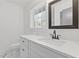 Bathroom with single vanity and marble countertop at 4045 White Oak Sw Ln, Lilburn, GA 30047