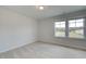 Spacious bedroom with neutral walls and carpet flooring at 455 Payne Dr, Mcdonough, GA 30253