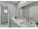 Modern bathroom with double vanity and walk-in shower at 5102 Anclote Dr, Alpharetta, GA 30022