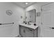 Modern bathroom with double vanity and geometric floor tiles at 5102 Anclote Dr, Alpharetta, GA 30022