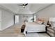 Main bedroom with wood-look floors and ensuite bathroom access at 5102 Anclote Dr, Alpharetta, GA 30022