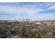 Expansive aerial view showcasing the skyline, surrounding neighborhoods, and lush greenery at 160 Vanira Se Ave # A, Atlanta, GA 30315