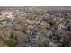Picturesque aerial view of a neighborhood with mature trees, residential houses, and city skyline at 160 Vanira Se Ave # A, Atlanta, GA 30315