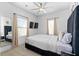 Bedroom features modern design with bright natural light, ceiling fan, and sleek furnishings at 160 Vanira Se Ave # A, Atlanta, GA 30315