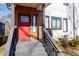 Inviting front entrance with a red door and modern house number offers a welcoming aesthetic at 160 Vanira Se Ave # A, Atlanta, GA 30315