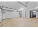 Spacious garage with high ceilings and ample storage space for vehicles and other belongings at 160 Vanira Se Ave # A, Atlanta, GA 30315