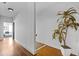 Hallway featuring bright and airy space with hardwood flooring, elegant lighting, and stylish design at 160 Vanira Se Ave # A, Atlanta, GA 30315