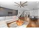 Spacious open-concept living room and dining area with hardwood floors is an entertainer's dream at 160 Vanira Se Ave # A, Atlanta, GA 30315