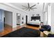 Spacious main bedroom boasts natural light, wood floors, a ceiling fan and stylish black accents at 160 Vanira Se Ave # A, Atlanta, GA 30315
