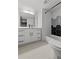 Modern bathroom with hexagon tile and white vanity at 160 Vanira Se Ave # A, Atlanta, GA 30315