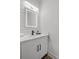 Modern bathroom with white vanity and a frameless mirror at 160 Vanira Se Ave # A, Atlanta, GA 30315