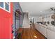 Bright entryway with red door, hardwood floors, and staircase at 160 Vanira Se Ave # A, Atlanta, GA 30315