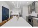 Modern kitchen with an island and view to living room at 160 Vanira Se Ave # A, Atlanta, GA 30315