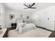 Comfortable bedroom with ceiling fan and plush bedding at 380 Atwood Nw Dr, Marietta, GA 30064