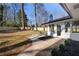 Backyard view of ranch house with new landscaping and walkway at 380 Atwood Nw Dr, Marietta, GA 30064