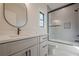 Elegant bathroom with a shower/tub combo and modern vanity at 4840 Northway Dr, Atlanta, GA 30342