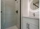 Modern bathroom with a frameless shower and sleek vanity at 4840 Northway Dr, Atlanta, GA 30342