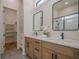 Double vanity bathroom with marble shower and walk-in closet at 4840 Northway Dr, Atlanta, GA 30342