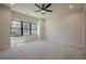 Spacious bedroom with large windows and ceiling fan at 4840 Northway Dr, Atlanta, GA 30342