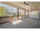 Covered deck overlooks private backyard with wooded views at 4840 Northway Dr, Atlanta, GA 30342