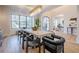 Modern dining room with hardwood floors and a view of the entryway at 4840 Northway Dr, Atlanta, GA 30342