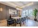 Elegant dining room with modern light fixture and hardwood floors at 4840 Northway Dr, Atlanta, GA 30342