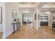 Sunlit entryway with hardwood floors, high ceilings and a view into the living area at 4840 Northway Dr, Atlanta, GA 30342