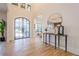 Light-filled entryway with hardwood floors and view of the front door and living areas at 4840 Northway Dr, Atlanta, GA 30342