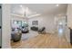 Open concept living area with hardwood floors and access to a deck at 4840 Northway Dr, Atlanta, GA 30342