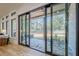 Sliding glass doors open to a backyard patio with flagstone at 4840 Northway Dr, Atlanta, GA 30342