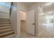 Modern staircase leading to upper level with a storage closet at 4840 Northway Dr, Atlanta, GA 30342