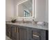 Bathroom vanity with granite countertop and LED lit mirror at 4840 Northway Dr, Atlanta, GA 30342