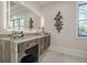 Modern vanity with a large lit mirror and granite countertop at 4840 Northway Dr, Atlanta, GA 30342