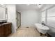 Elegant bathroom with soaking tub, walk-in shower, and double vanity at 5035 Villa Rica Hwy, Dallas, GA 30157